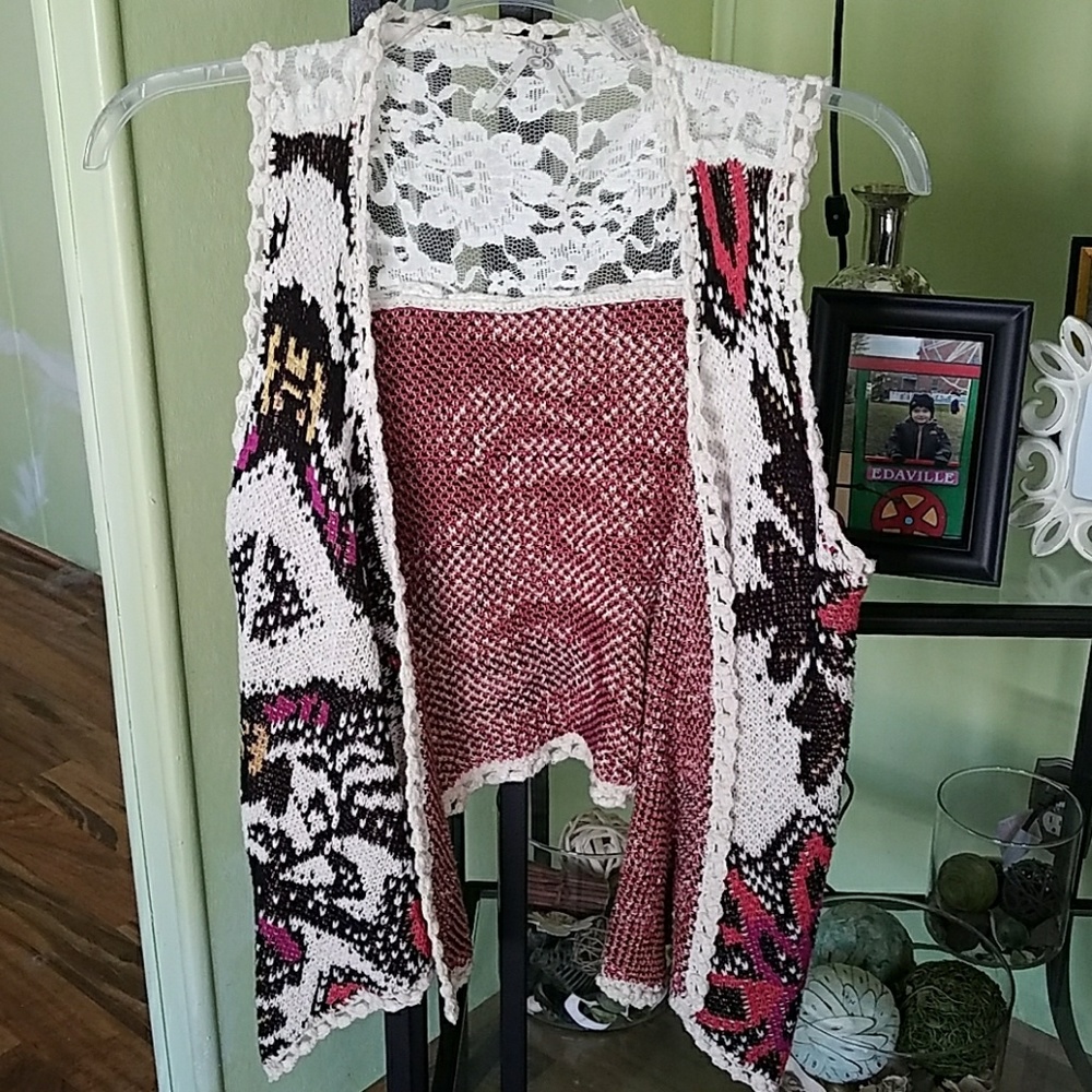 Super cute hi low sweater vest from Buckle